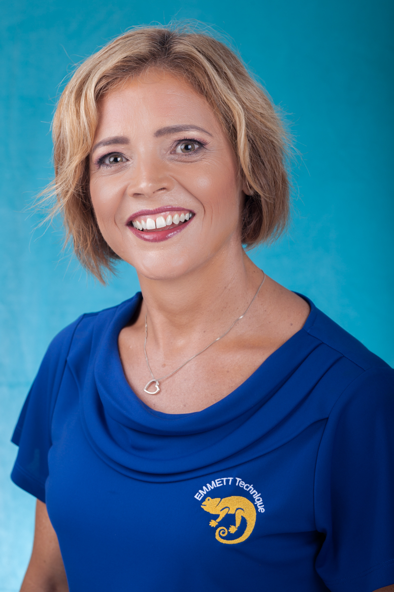 Business woman portrait with blue background